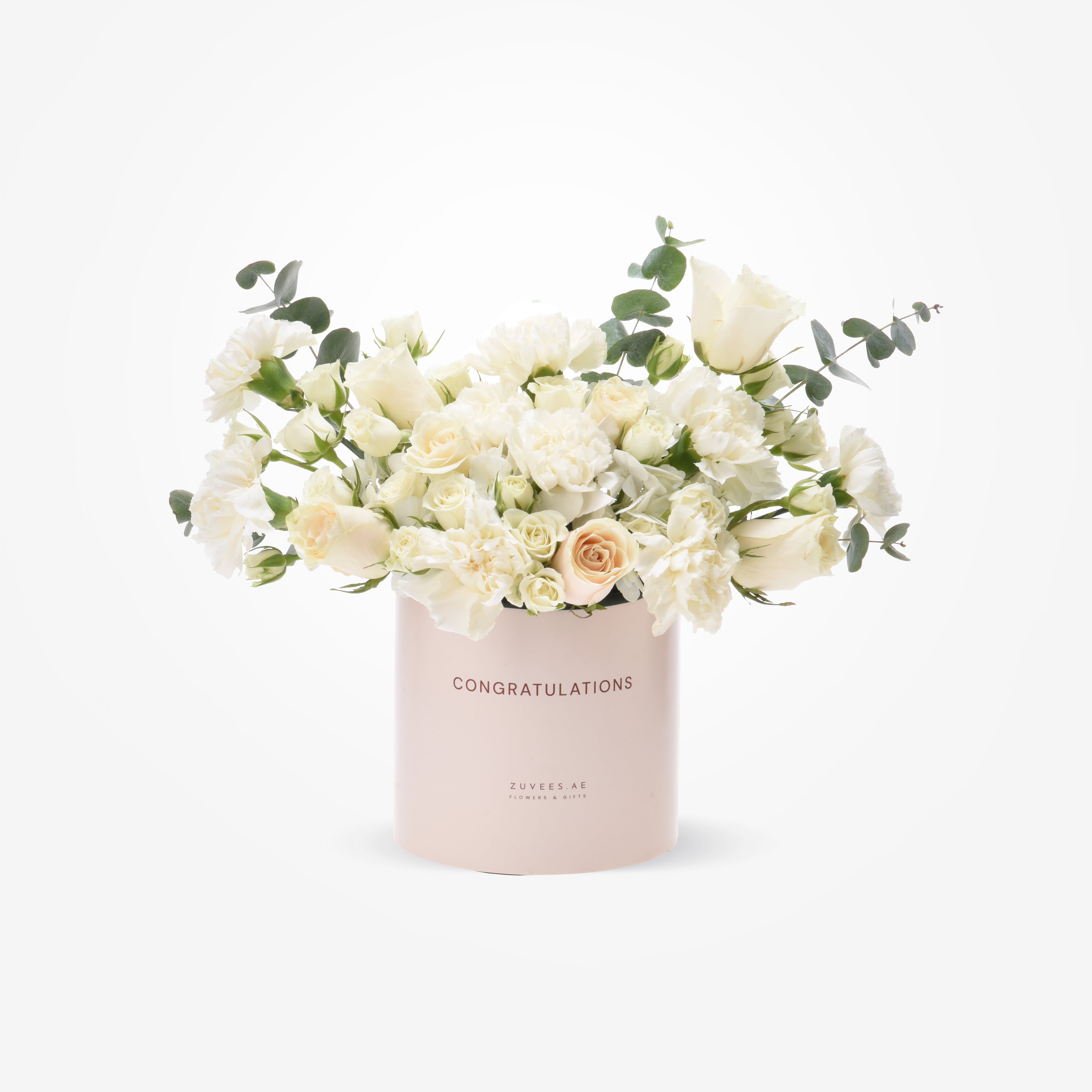 Elegant white rose and eucalyptus bouquet in blush "Congratulations" cylinder.