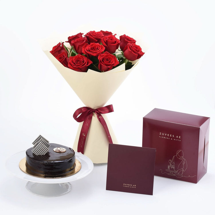 Luxurious red roses bouquet with chocolate cake and branded gift box.