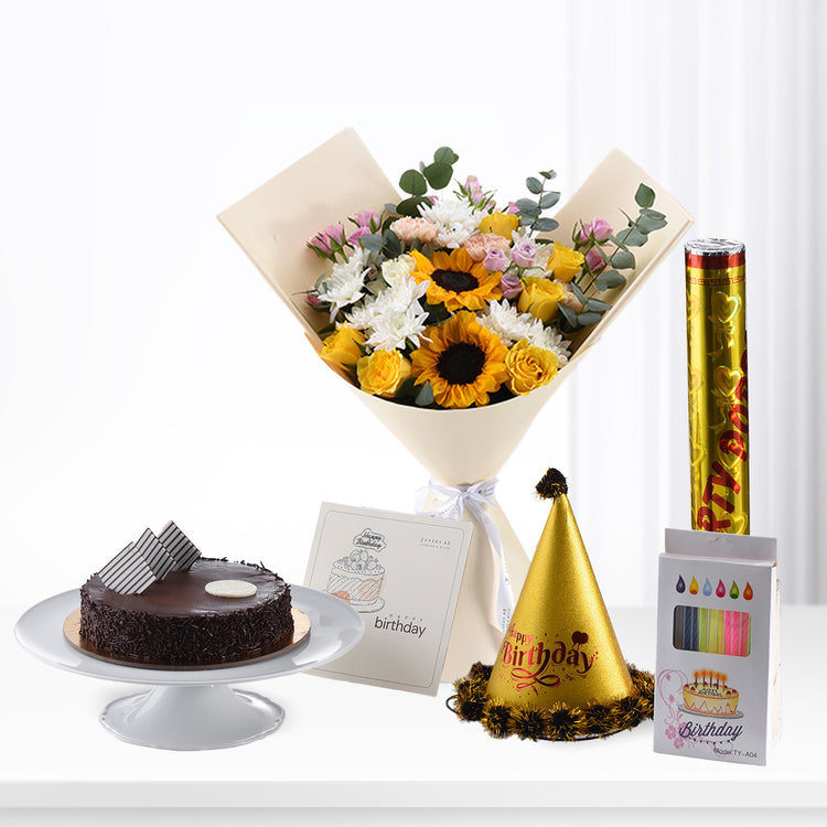 Rich chocolate cake, vibrant sunflower bouquet, gold party hat, colorful candles, festive birthday gift set.