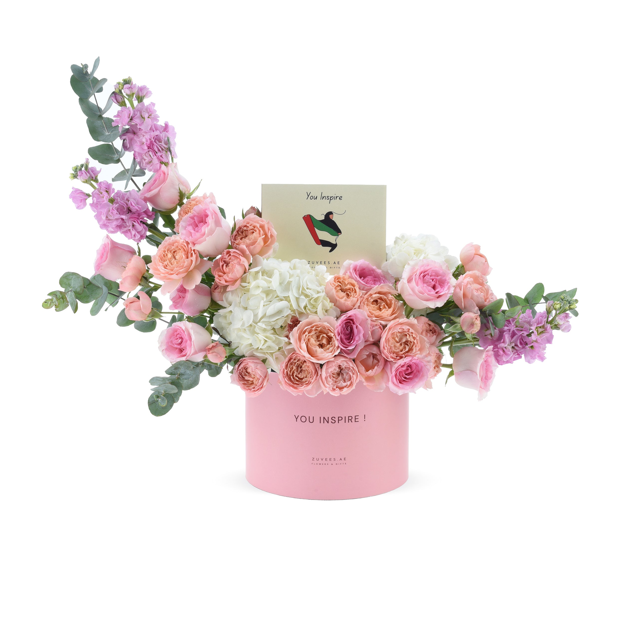 Soft pink roses, hydrangeas, and eucalyptus in a matching pink box with “You Inspire” card.