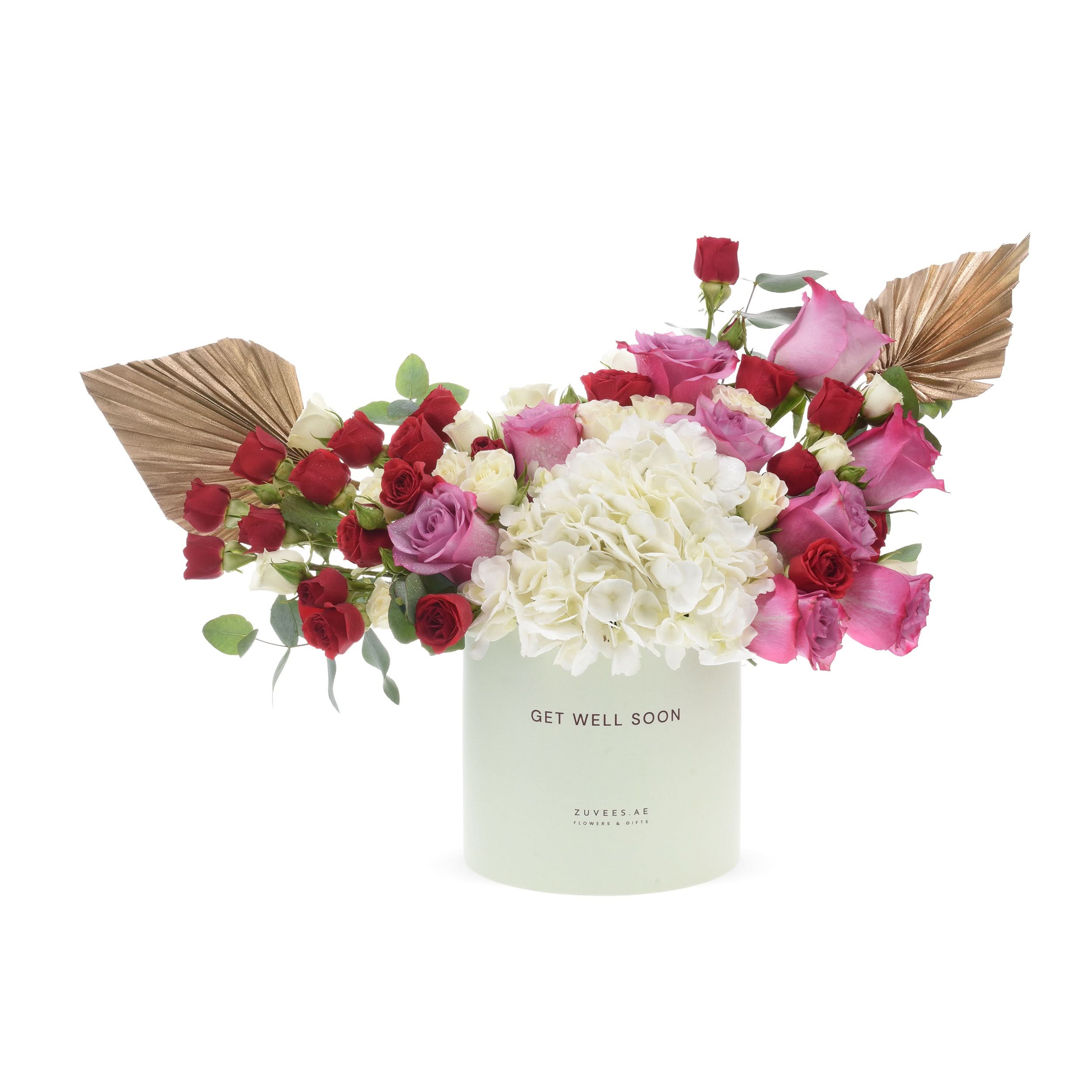 Pastel green vase holds vibrant red, pink, and white roses with gold fan accents.