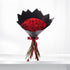 Vibrant red roses in sleek black wrap, tied with burgundy ribbon, elegant and romantic.