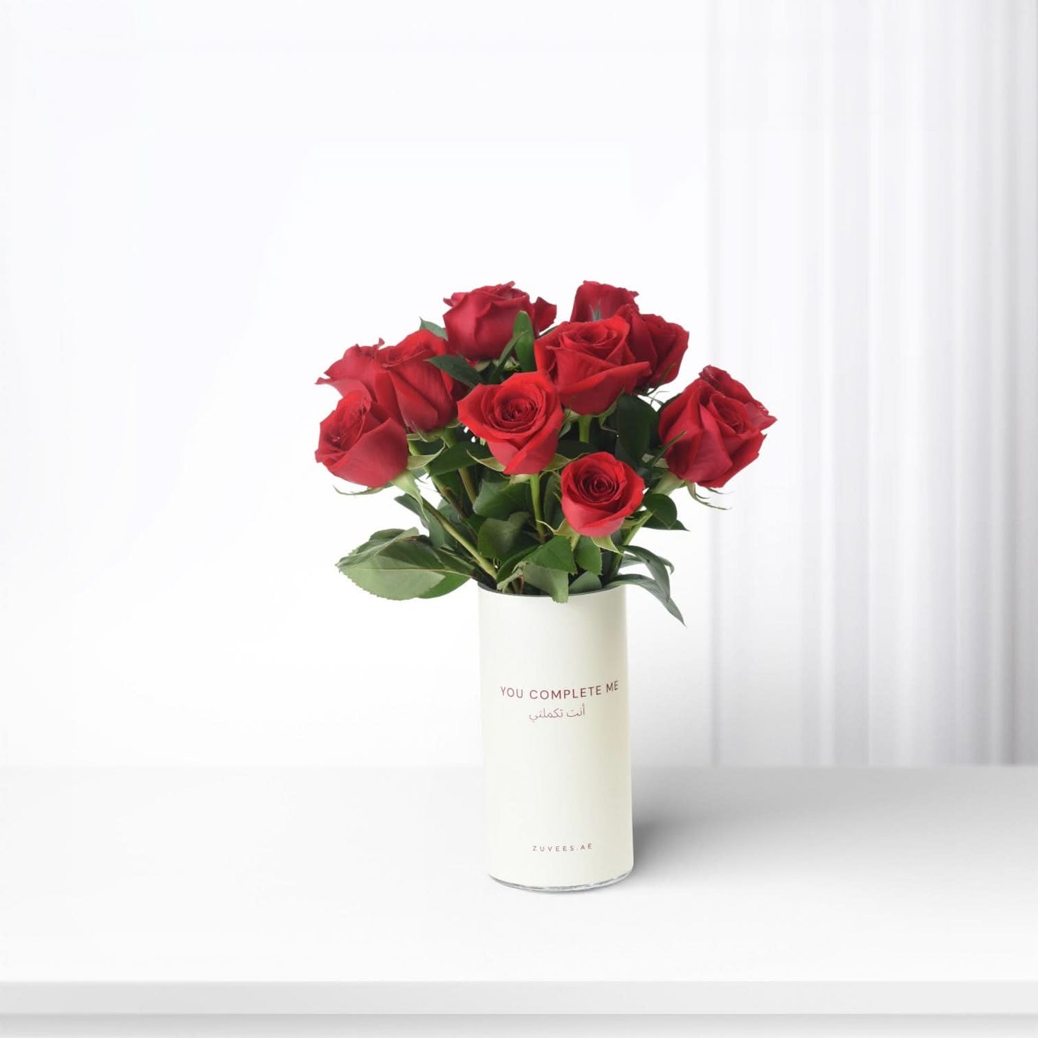 15 Red Roses In Sand Vase - Zuvees.ae