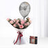 Pink roses, silver "Happy Birthday" balloon, and chocolate gift box.