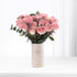 Soft pink roses in minimalist white vase with "Thank You" text.