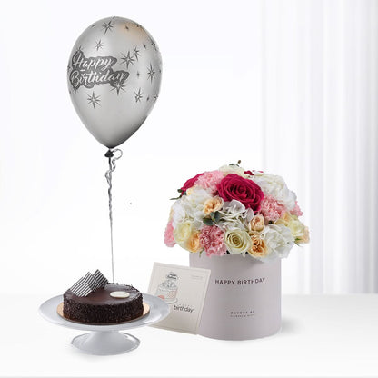 Silver balloon, floral bouquet, chocolate cake — elegant birthday gift set.