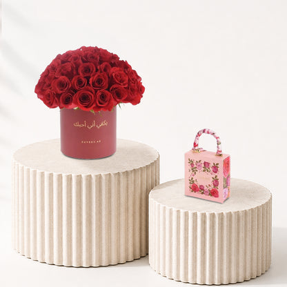51 Roses in Red Aura Arabic Love Vase Chocolate Combo - Zuvees.ae