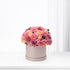 Pink and peach roses and carnations in matte taupe hat box.