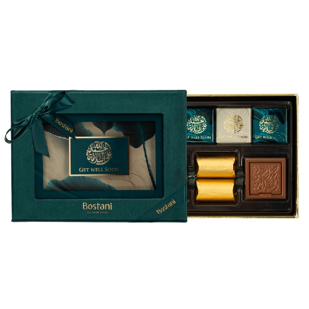 Emerald green gift box with gold "Get Well Soon" chocolates and elegant ribbon.