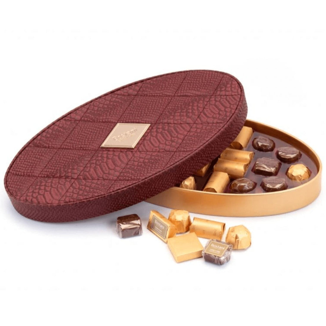 Luxurious burgundy croc-embossed chocolate gift box with gold foil-wrapped treats.