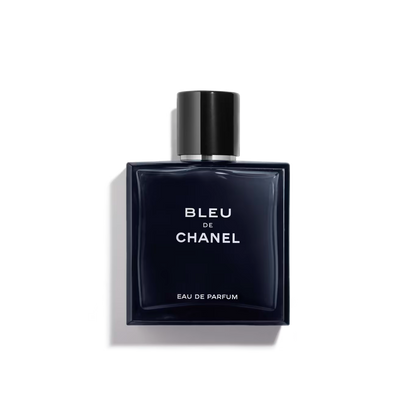 Sleek navy bottle with black cap, bold white "Bleu de Chanel" text.