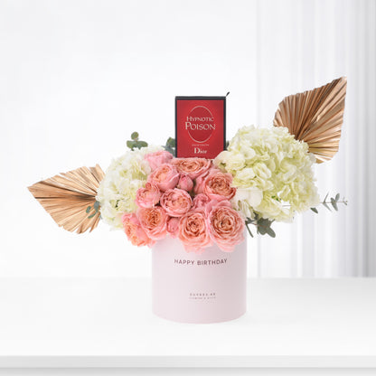 Pink roses and hydrangeas with gold fans, Dior perfume, in "Happy Birthday" vase.