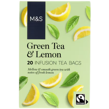 Light green pack with lemon slices and leaves, Fairtrade certified green tea &amp; lemon bags.