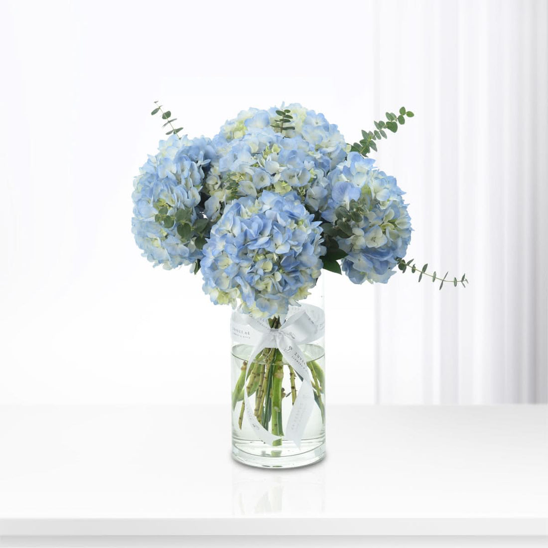 Deep blue midnight hydrangeas arranged in a vase, Zuvees flower delivery UAE