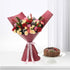 Vibrant red, pink, and cream roses with pinecones and berries, elegantly wrapped in burgundy paper with pink ribbon, beside a chocolate cake.