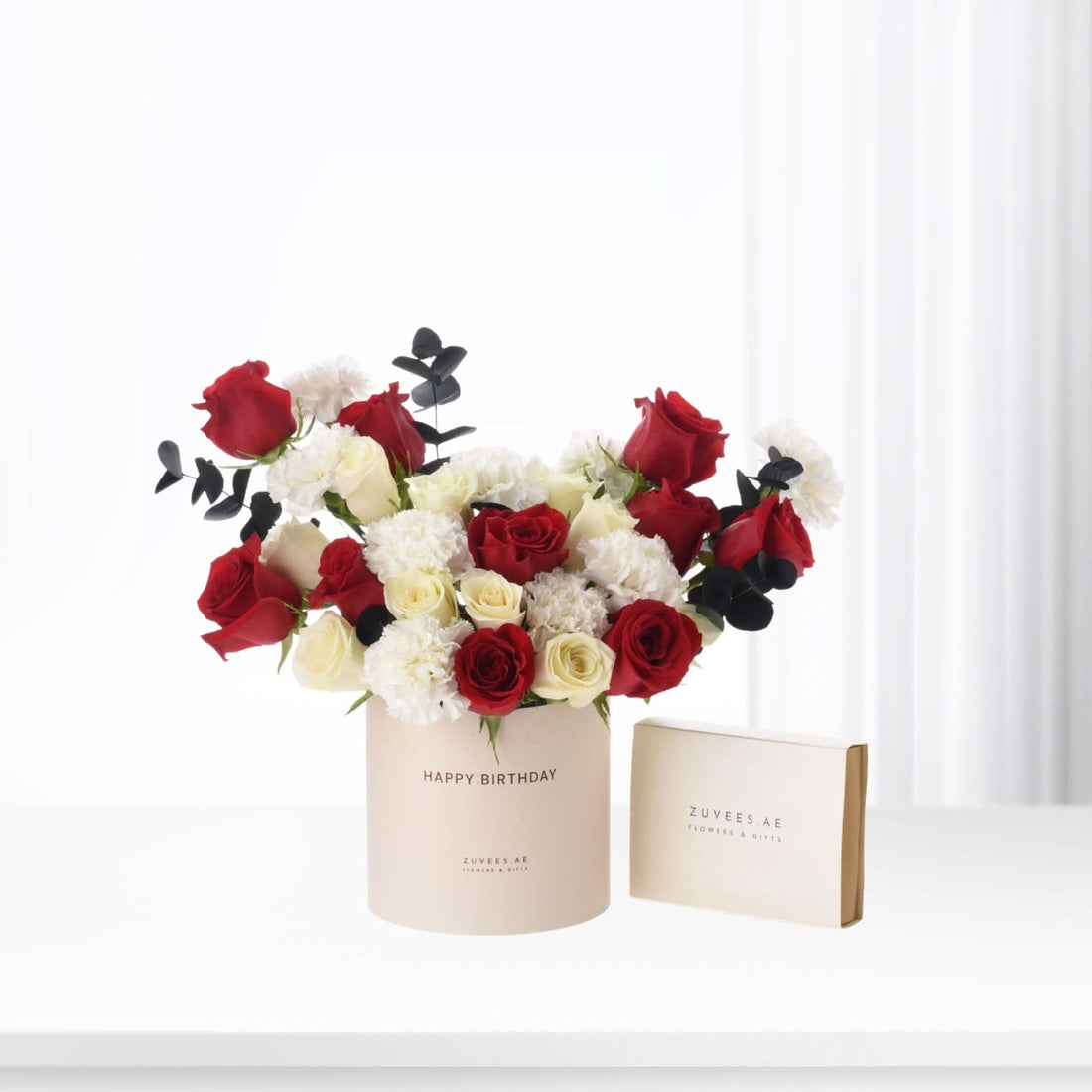 Elegant red, white roses and carnations in beige "Happy Birthday" box with branded gift box.