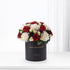 Elegant black box with "Happy Anniversary" holds red roses and white carnations.