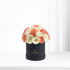 Elegant coral and ivory roses & carnations in matte black box.