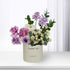 Elegant lavender and white rose bouquet in cream “Thank You” cylinder vase.