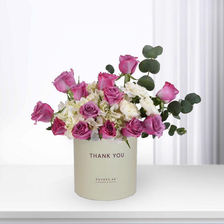Pink roses, white hydrangeas, eucalyptus in cream "Thank You" gift box.