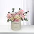 Soft pink and cream roses with eucalyptus in cream box reading "Thank You".