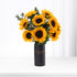 Vibrant sunflowers in matte black vase with "Happy Anniversary" text.