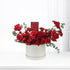 Luxurious red roses, carnations, eucalyptus in white box with Dior Hypnotic Poison perfume.