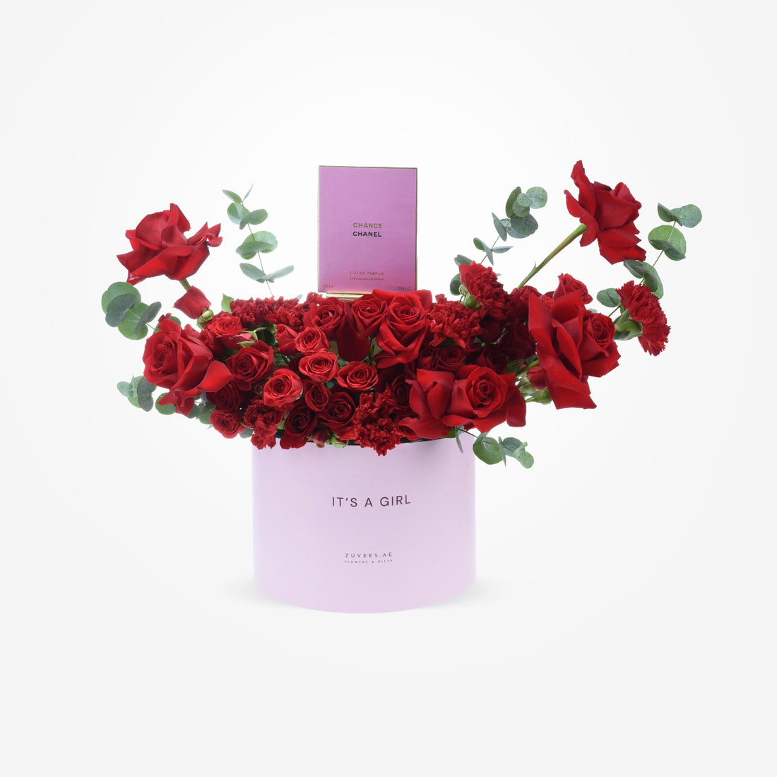 Vibrant red roses and carnations spill from a lavender "It&