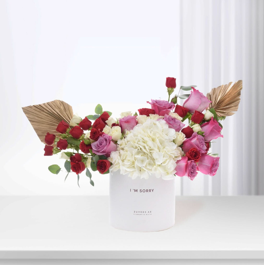 White vase with "I&