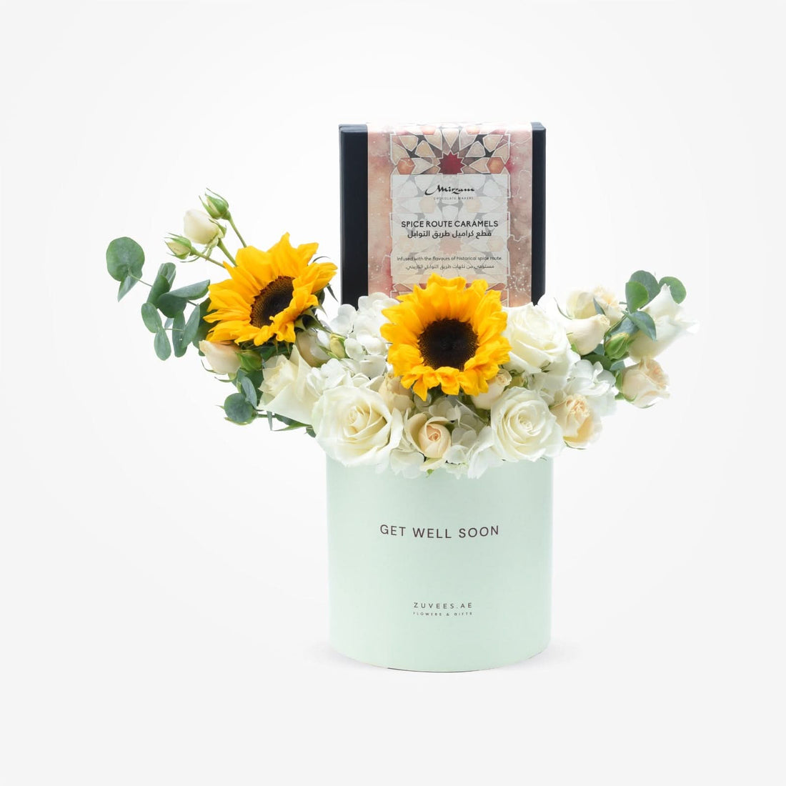 Sunflowers and white roses in mint vase with "Get Well Soon" and caramel gift box.