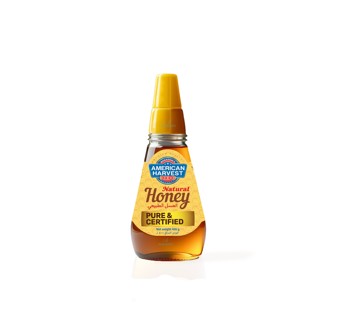 Golden honey bottle with yellow cap, "American Harvest" label, 400g pure certified.