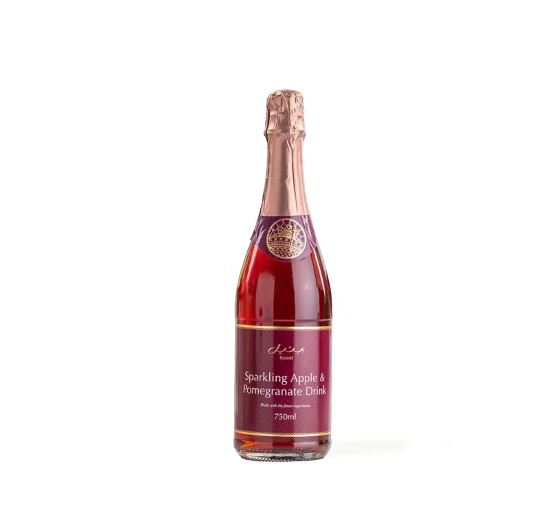 Elegant 750ml bottle of Sparkling Apple &amp; Pomegranate Drink, rich red hue, gold foil cap.