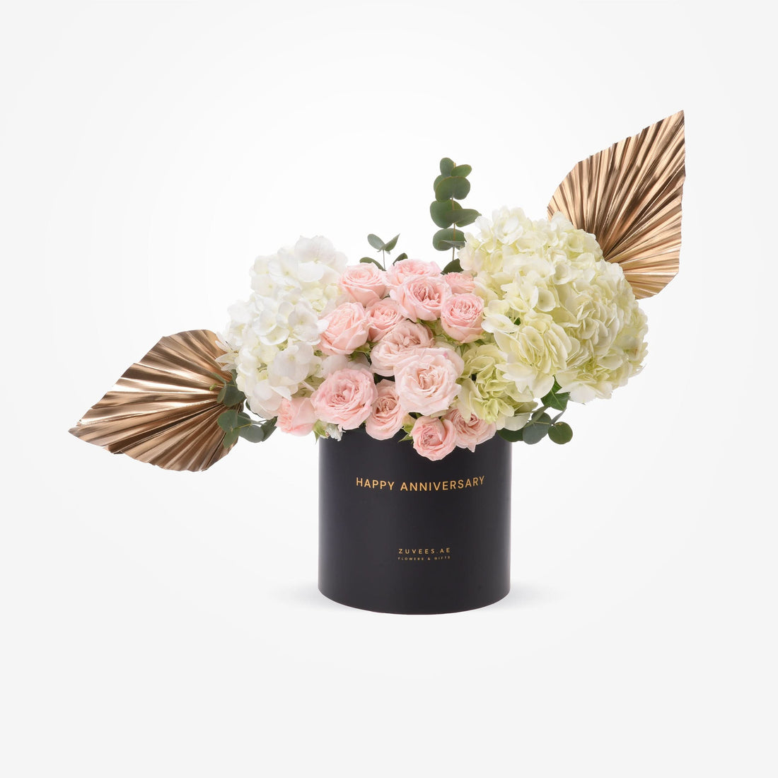 Elegant black vase with gold "Happy Anniversary" text, pink roses, white hydrangeas, and metallic gold leaves.