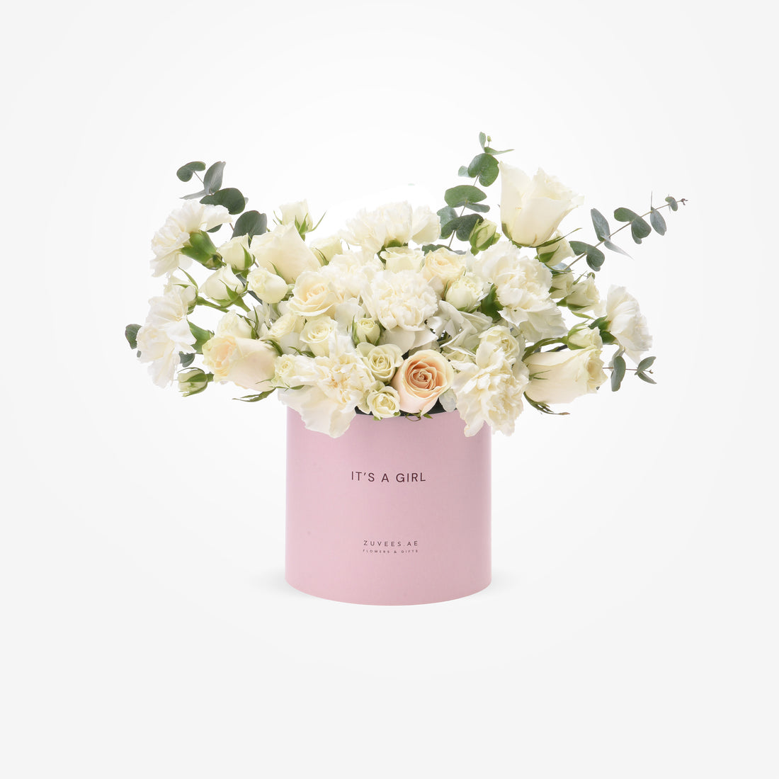 Soft pink box holds creamy white roses and eucalyptus, celebrating baby girl arrival.
