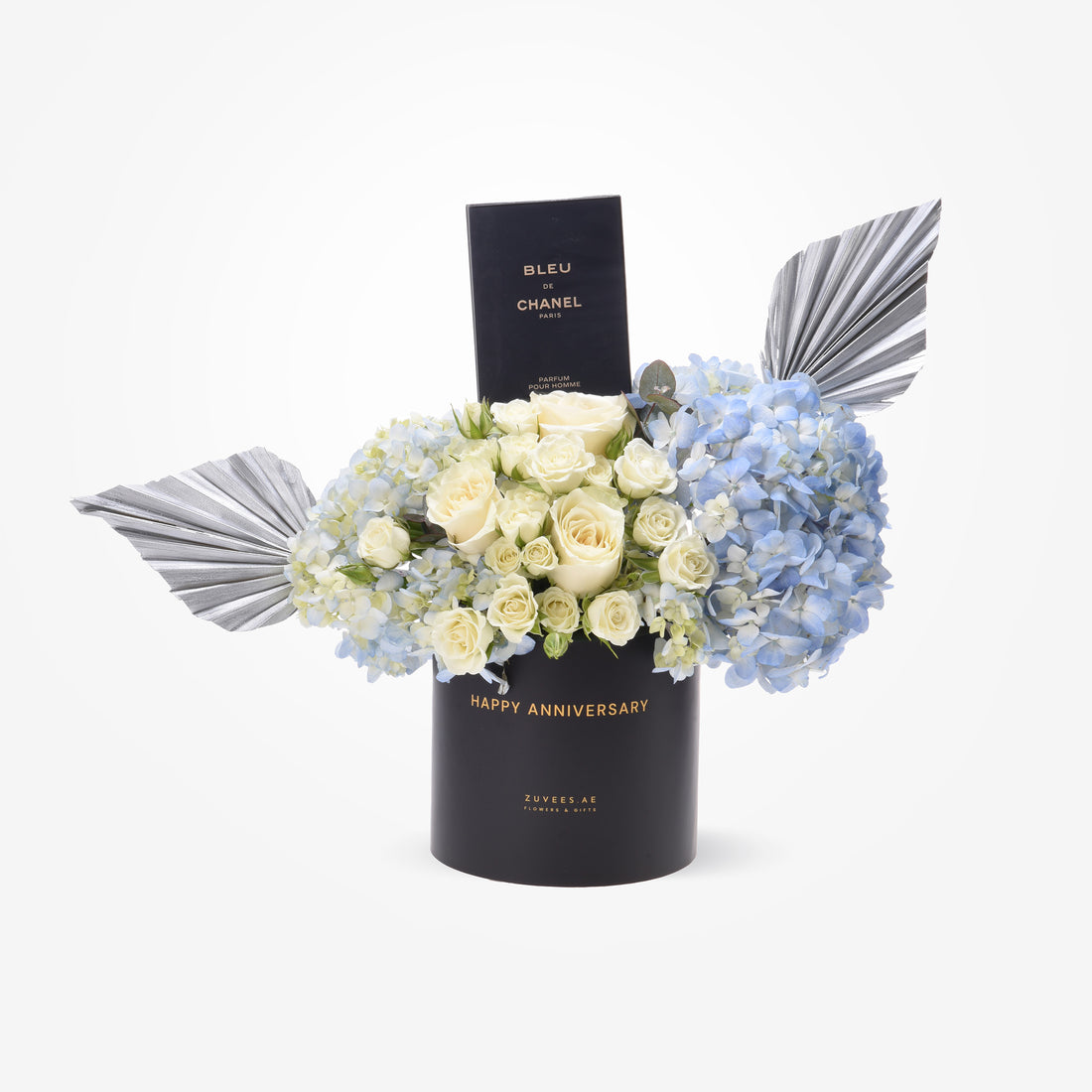 Elegant black anniversary gift box with white roses, blue hydrangeas, and silver fan accents.