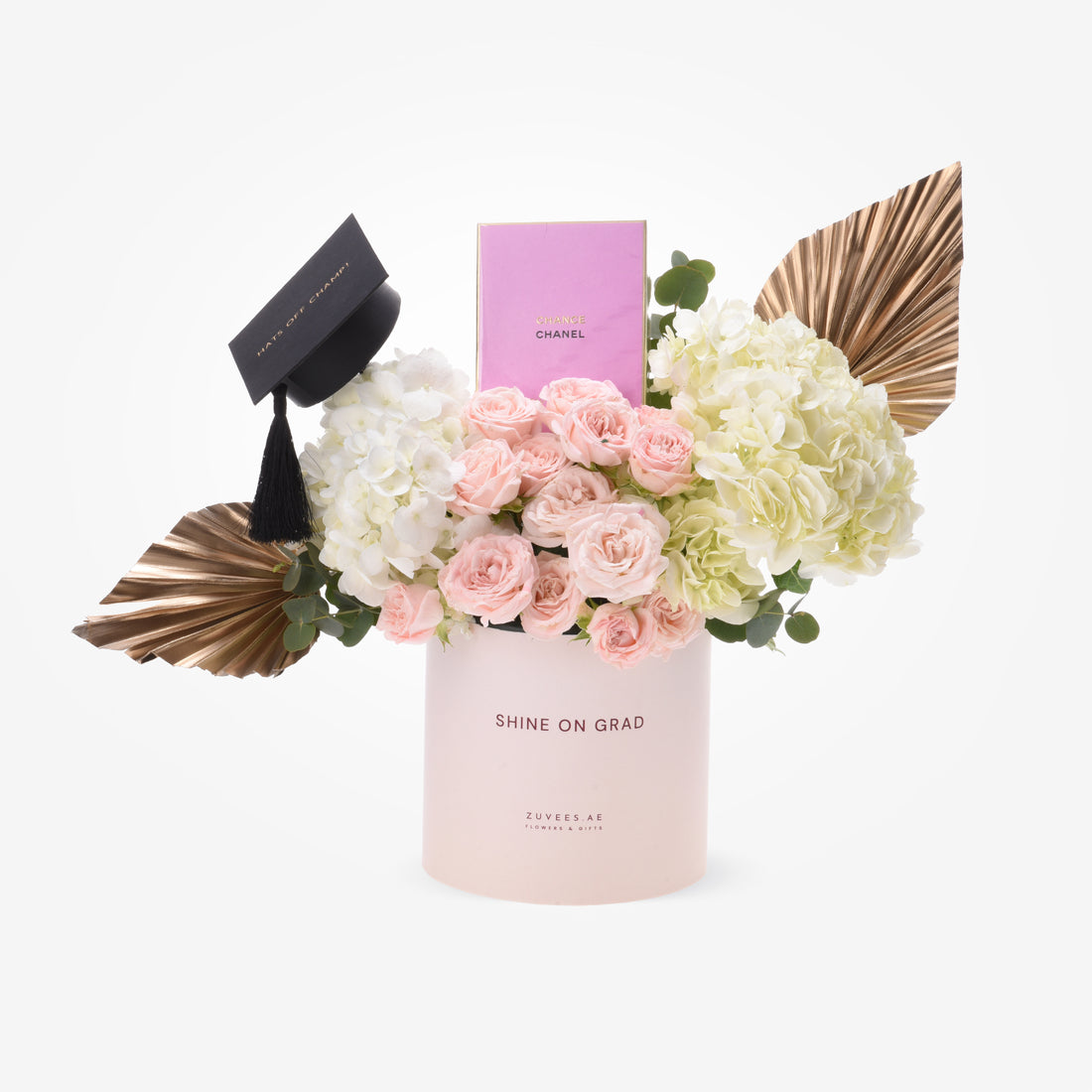 Pink roses and hydrangeas in a "Shine On Grad" box with graduation cap and Chanel perfume.