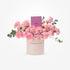 Soft pink roses and carnations in blush box with "Congratulations" and Chanel perfume.