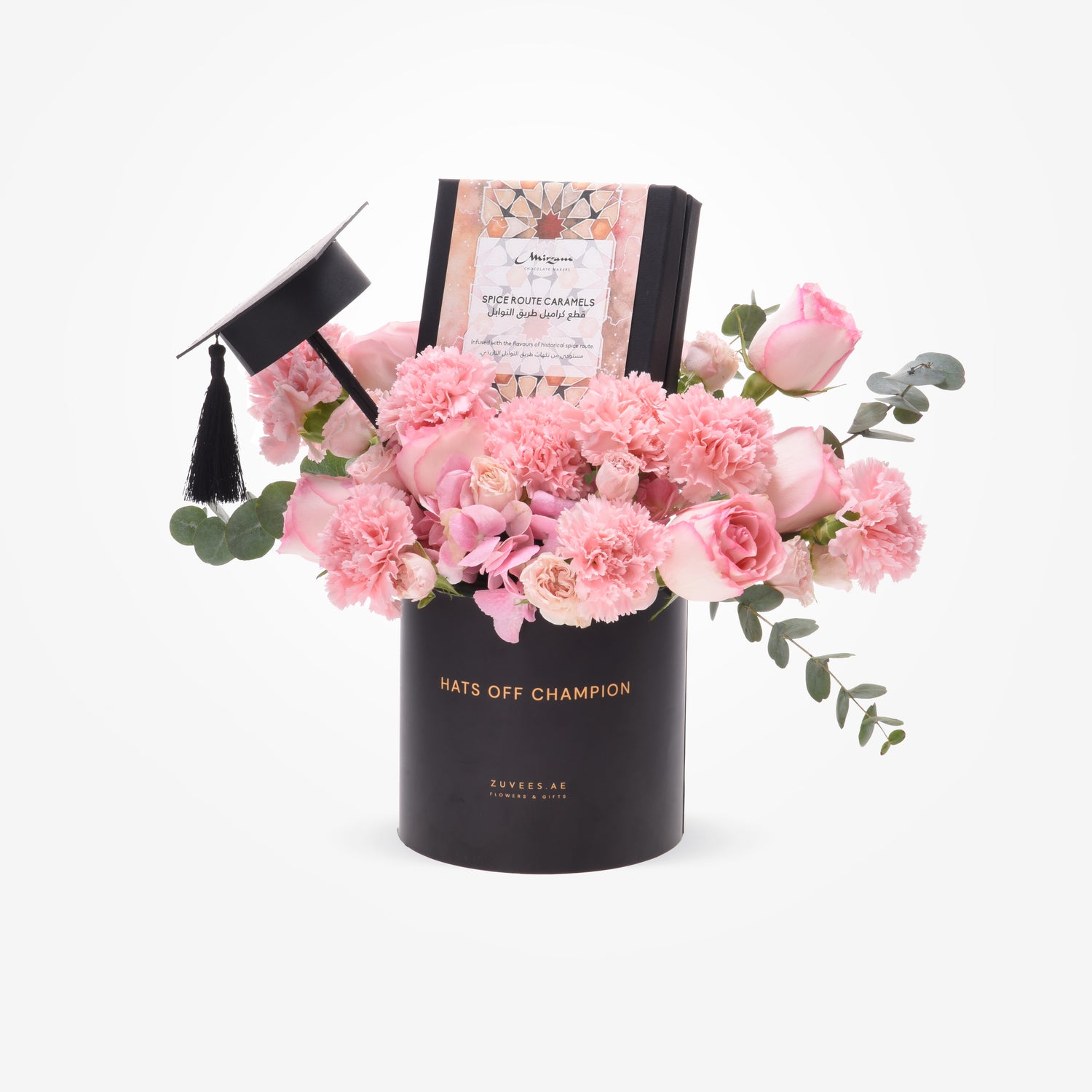 Black graduation-themed floral gift box with pink roses and carnations.