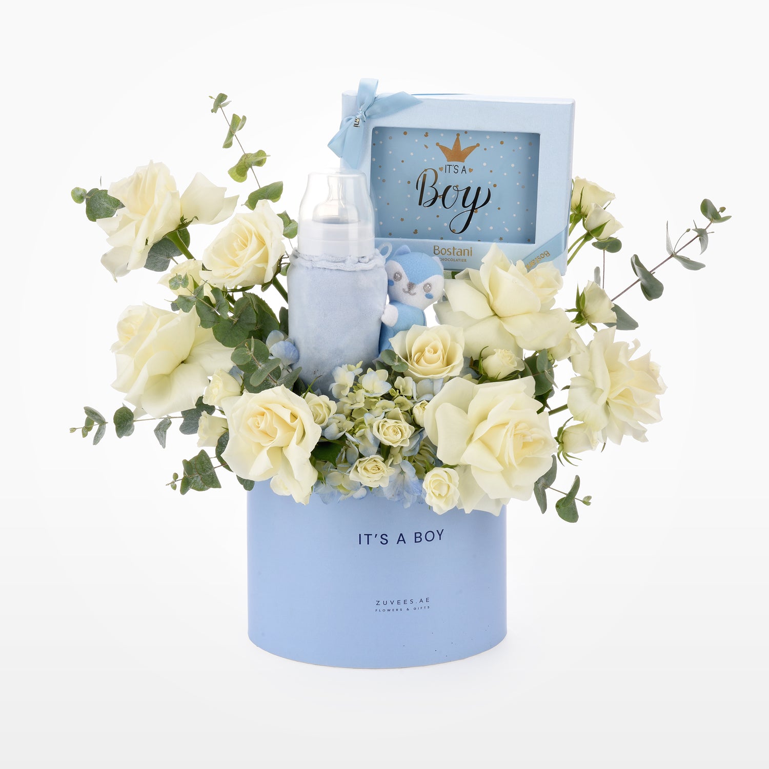 Soft blue baby-themed gift basket with creamy roses and plush toy.