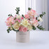 Pastel pink and cream roses with eucalyptus in a "Happy Birthday" cylinder.