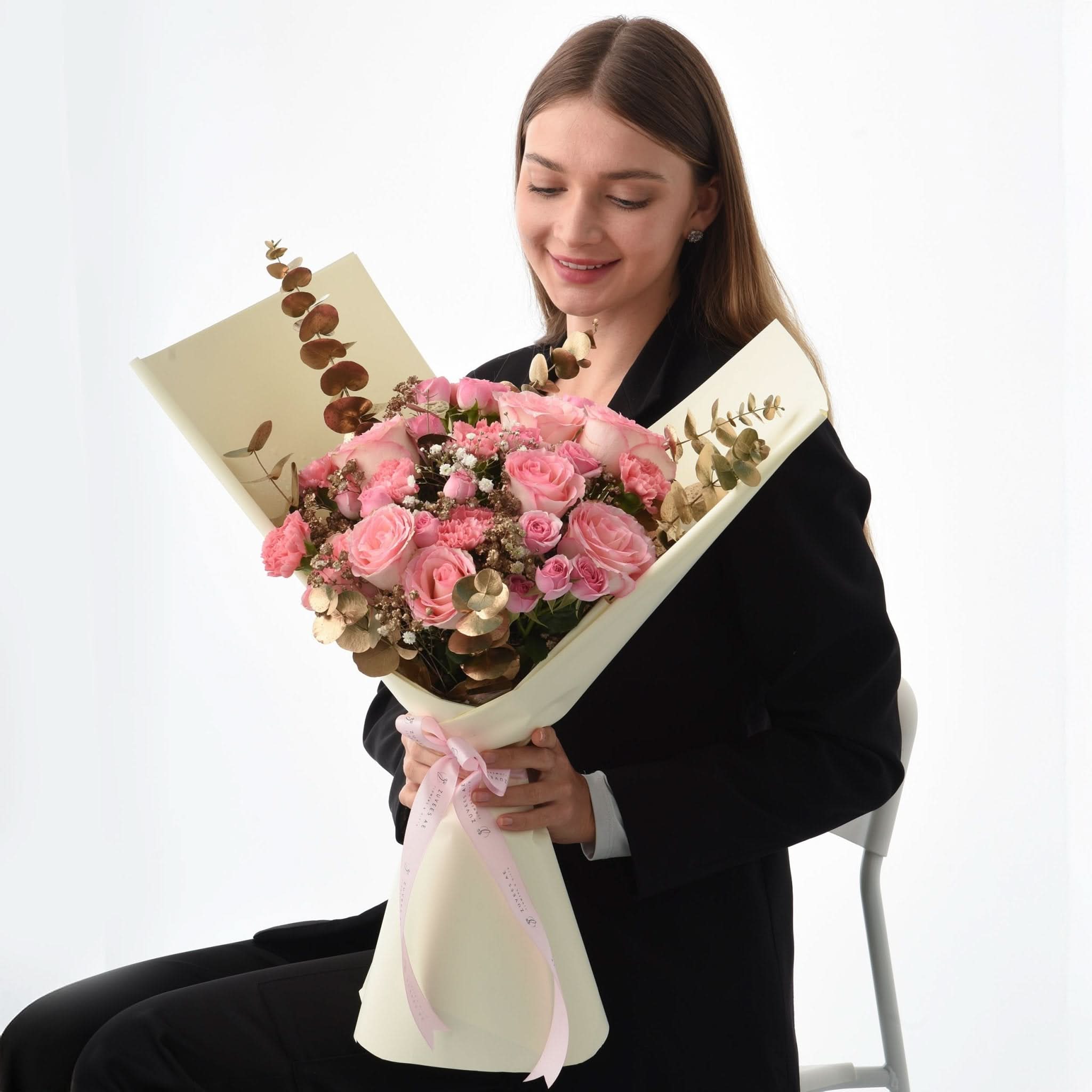 Soft pink roses, eucalyptus, and baby&