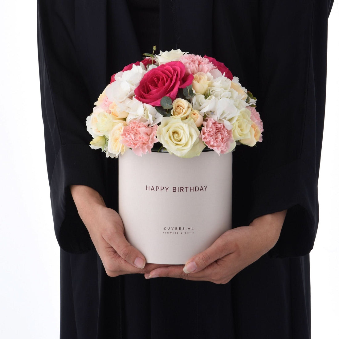 Elegant pink, white, and yellow floral arrangement in a "Happy Birthday" box.