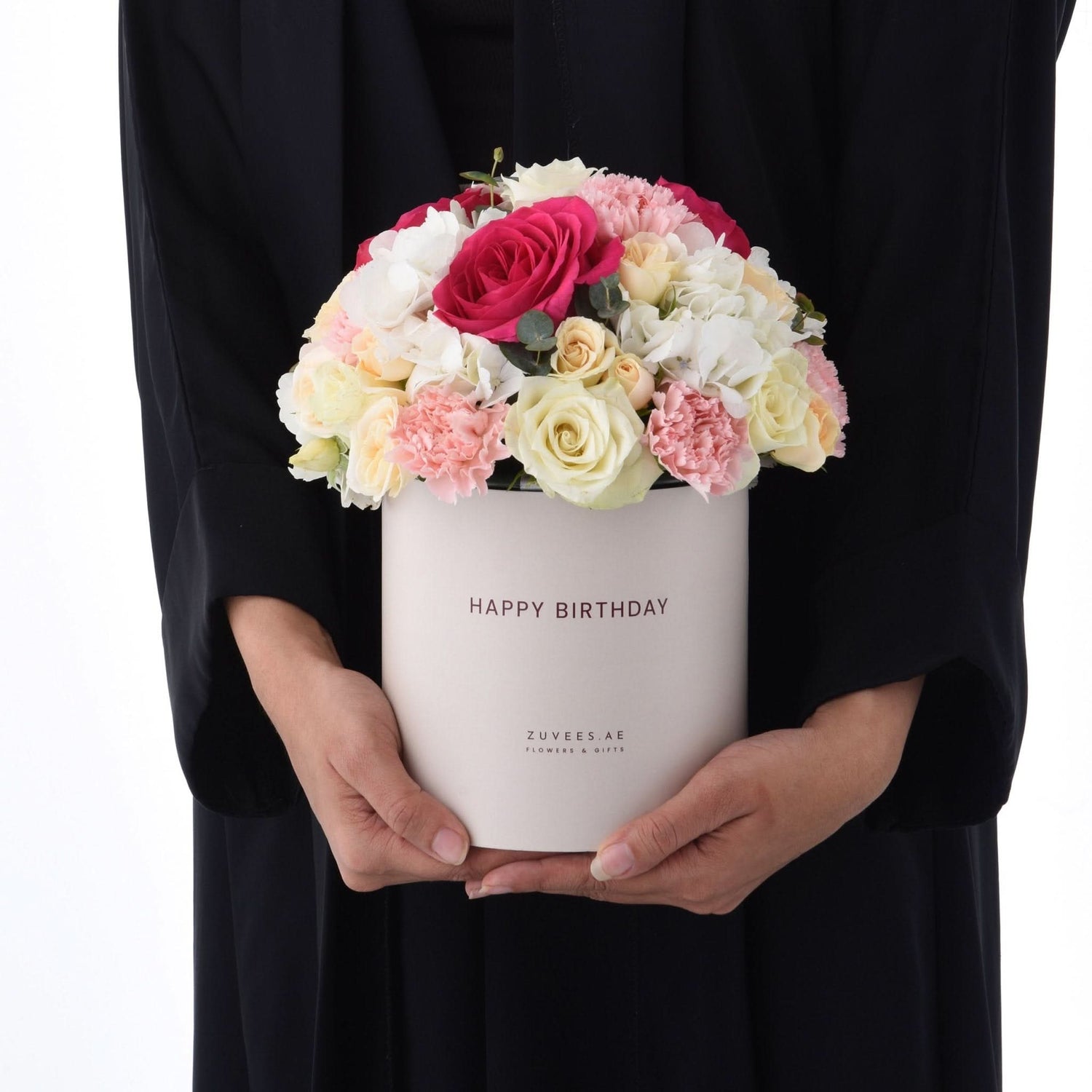 Elegant pink, white, and yellow floral arrangement in a "Happy Birthday" box.