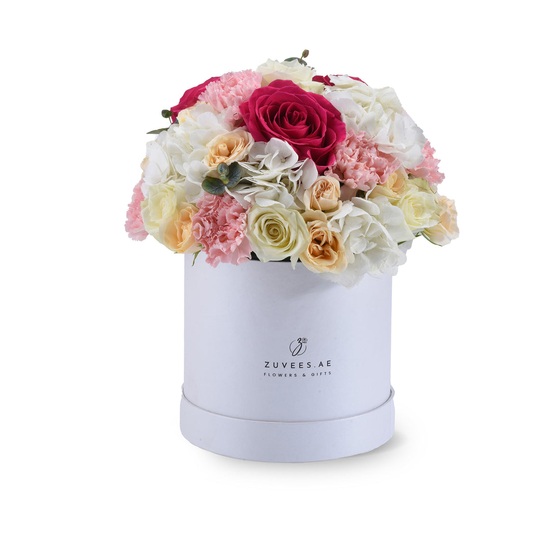 Elegant white hat box overflowing with vibrant pink, red, cream, and peach roses and hydrangeas.