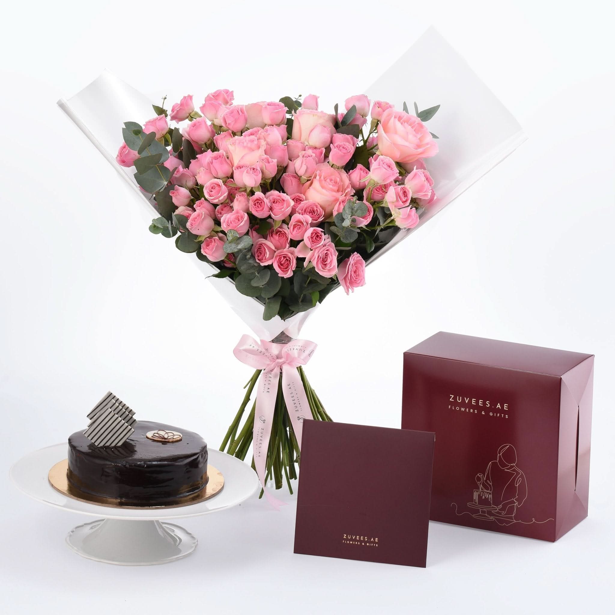 Pink roses bouquet with chocolate cake and ZUVEES.AE gift box.
