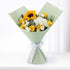 Sunflower, yellow and white roses bouquet in sage green wrap with white ribbon.