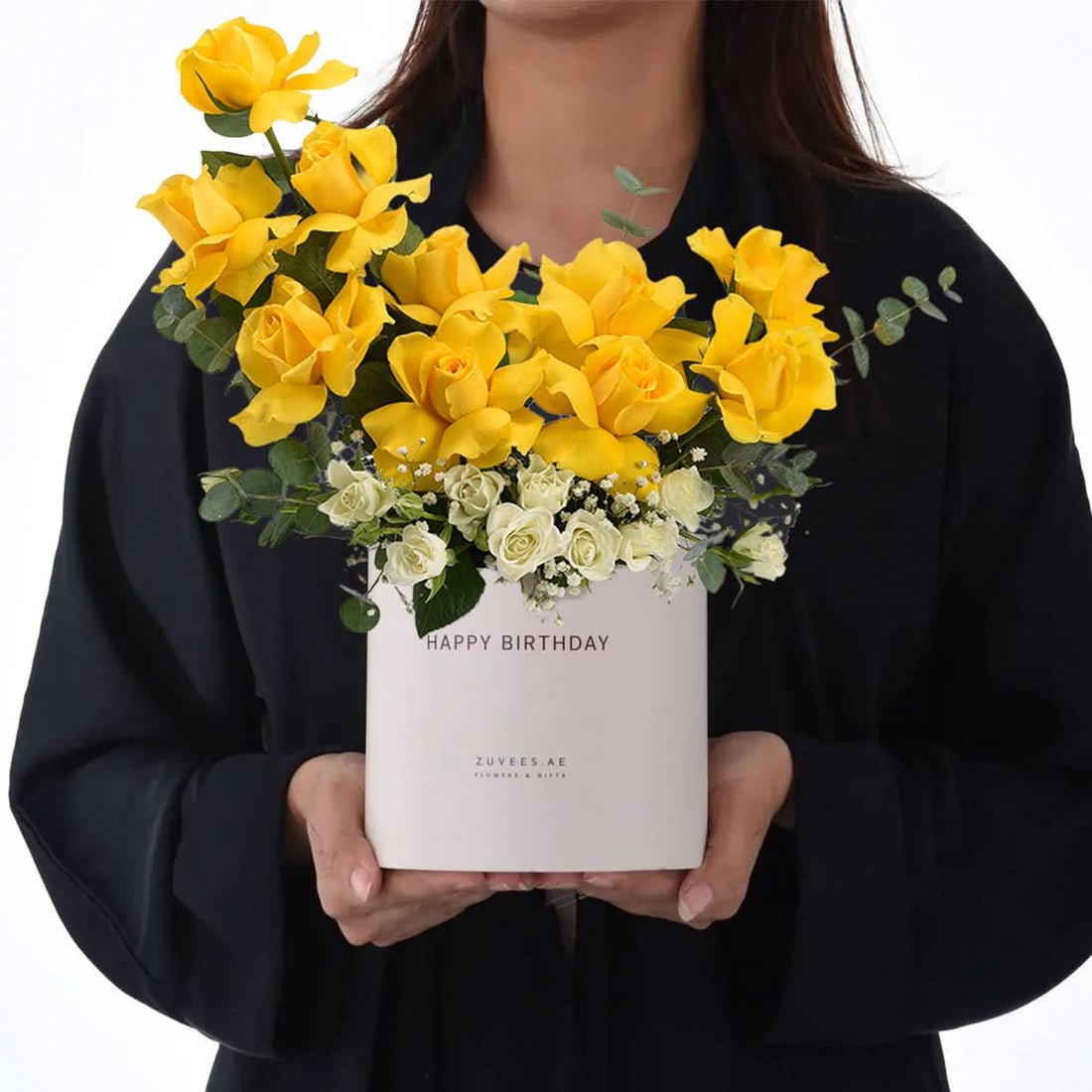 Vibrant yellow roses and white blooms in minimalist box with "Happy Birthday" text.