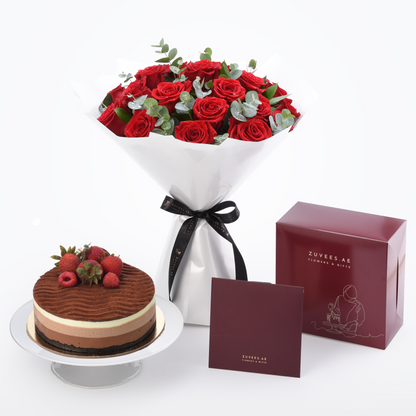 Luxurious red roses bouquet with chocolate cake and branded gift boxes.