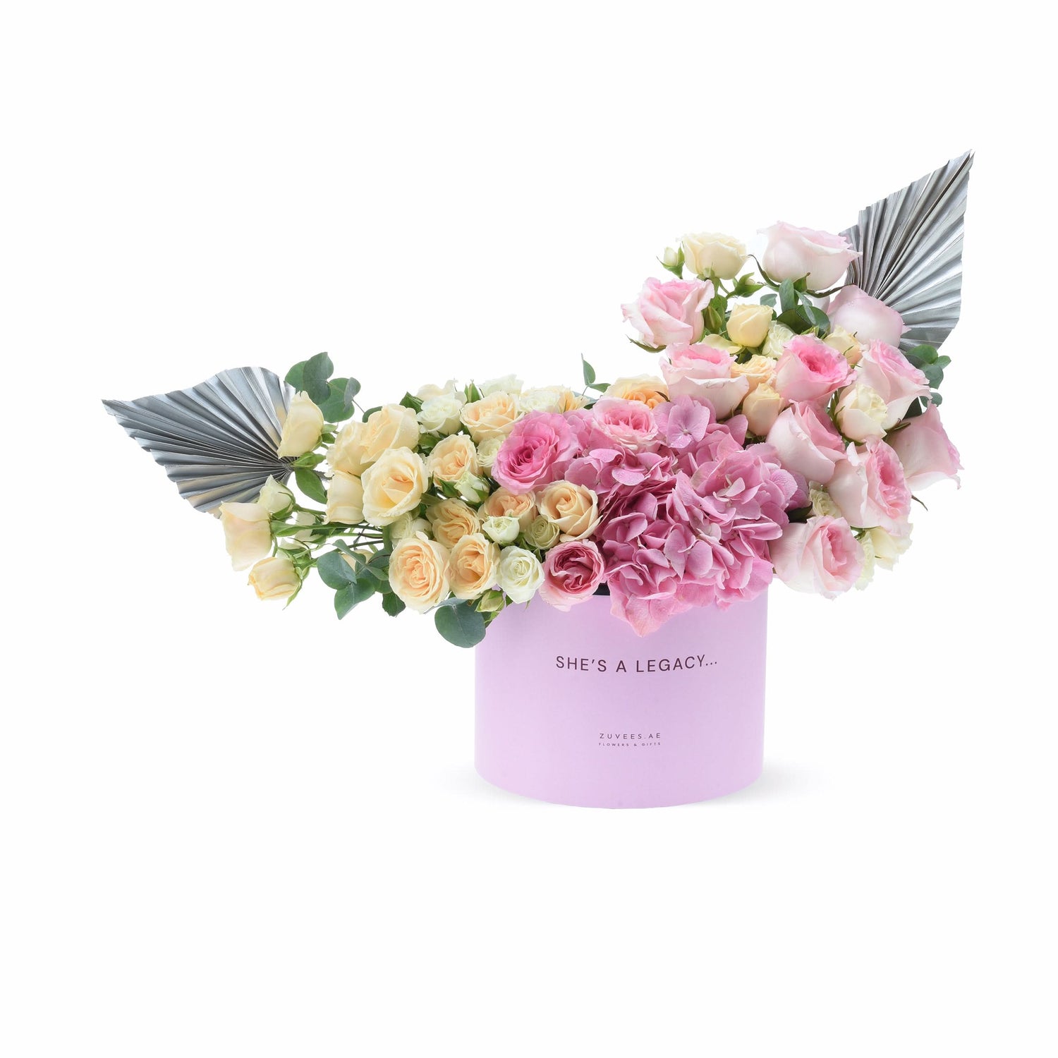 Pink box with roses, hydrangeas, silver leaves; "She&