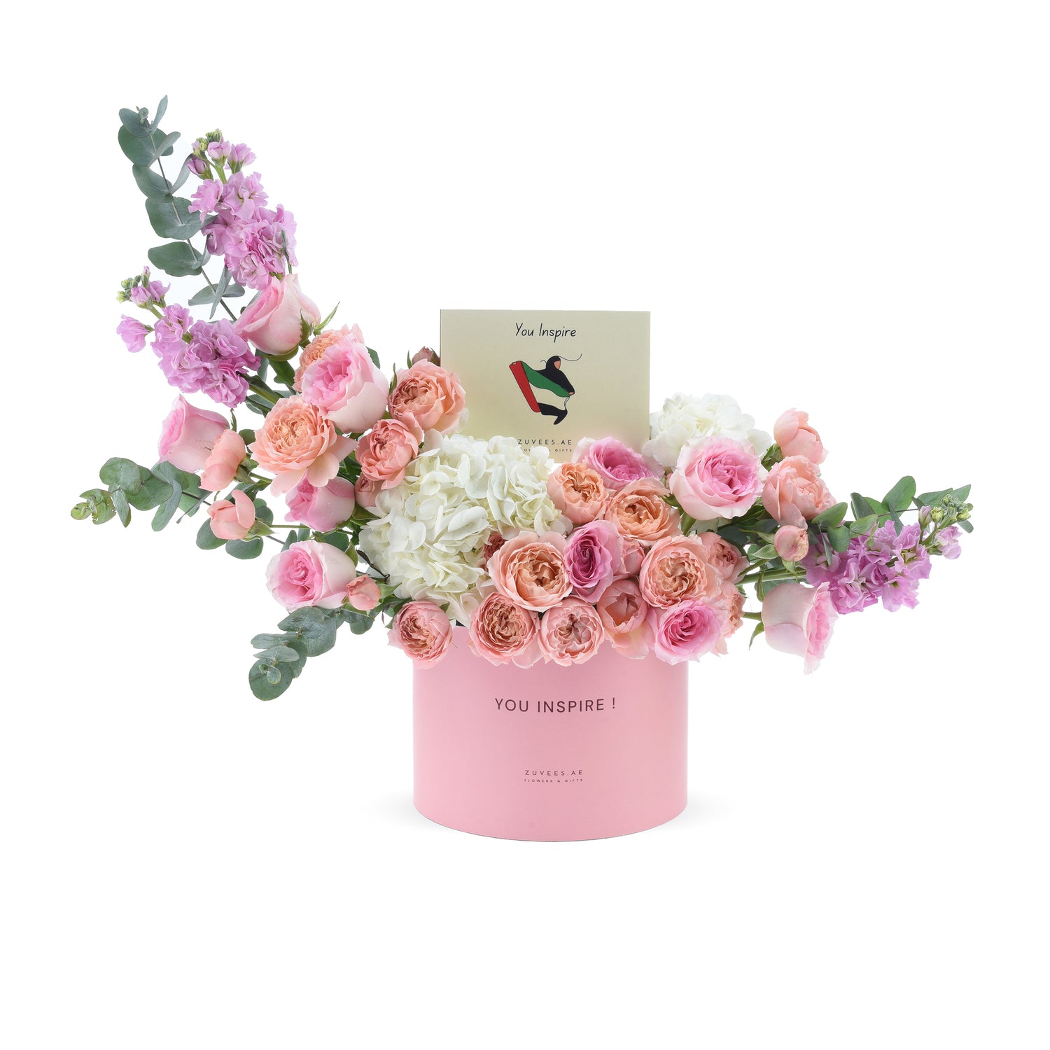 Soft pink roses, hydrangeas, and eucalyptus in a matching pink box with “You Inspire” card.